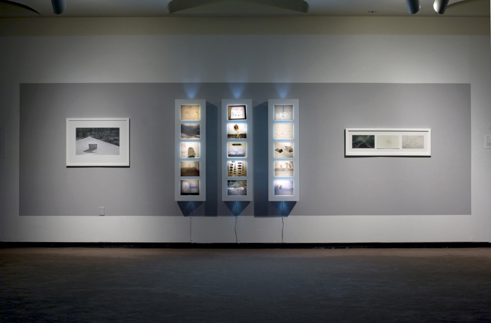 Sound Suspended Installation View I. Each light box 56" x 16" x 5" duratrans, wood, fluorescent tubes, glass. Gelatin silver print, pigmented ink on watercolor, spider web. 2006